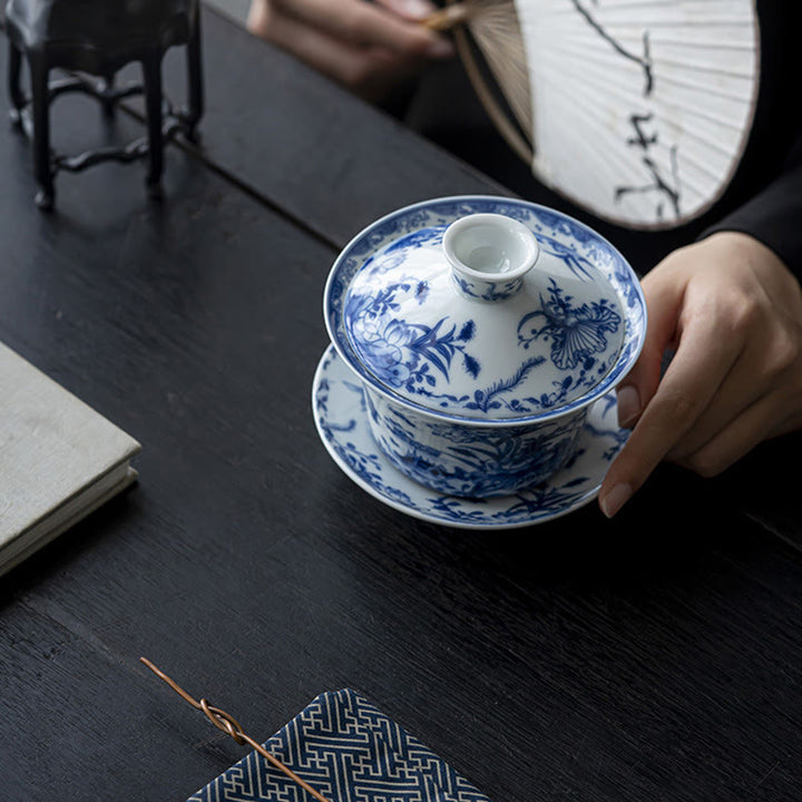 Buddha Stones Blu e Bianco Porcellana Loto Koi Pesce Danza del Leone Anguria Ceramica Gaiwan Sancai Tazza da Tè Kung Fu Tazza da Tè e Piattino con Coperchio 300ml