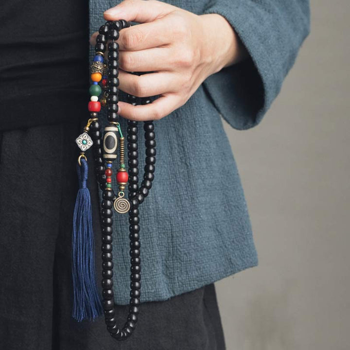 Buddha Stones 108 Perline Mala Legno di Ebano Dzi Perline Rame Braccialetto con Nappa