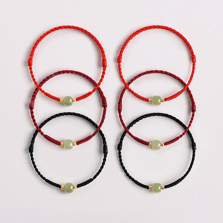 Bracciale intrecciato con Buddha Stones e portafortuna