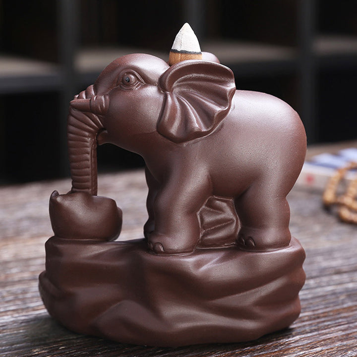 Decorazione per bruciatore di incenso con protezione per fontana di fumo a riflusso in argilla viola elefante tibetano