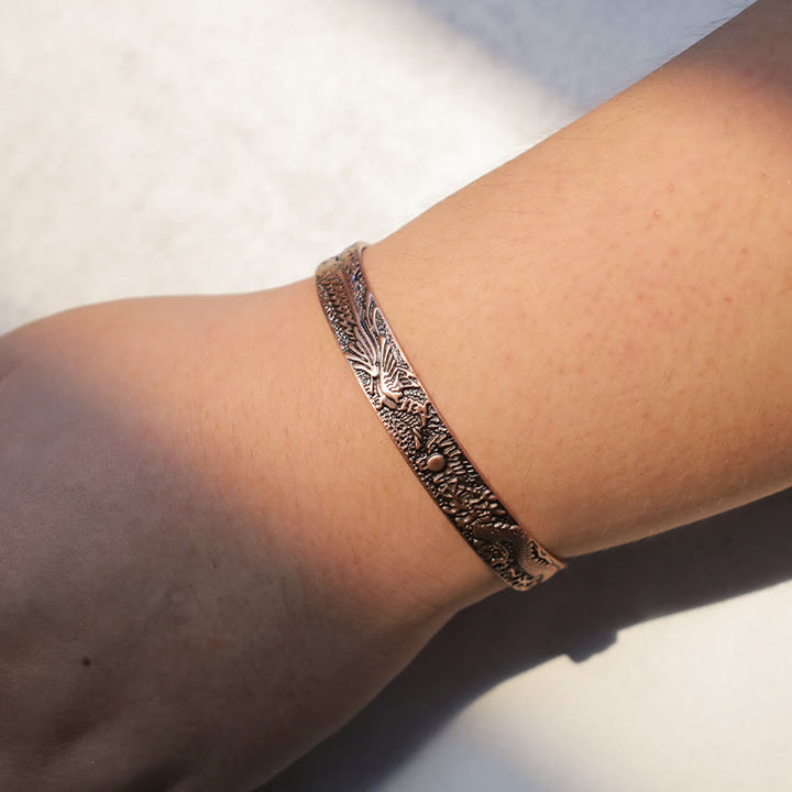 Bracciale rigido magnetico in rame massiccio con drago e fenice Buddha Stones