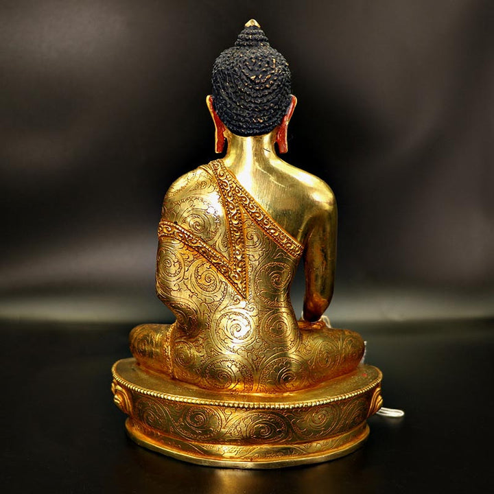 Statua di Buddha Shakyamuni Buddha della medicina Compassione in rame placcato oro Decorazione
