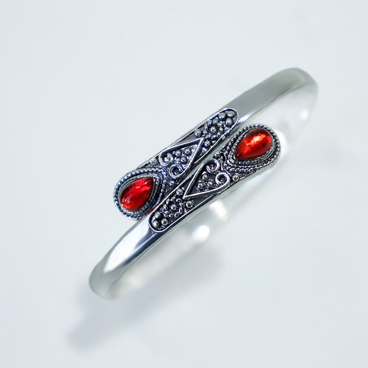 Braccialetto con polsino curativo con motivo a goccia d'acqua in zircone Buddha Stones