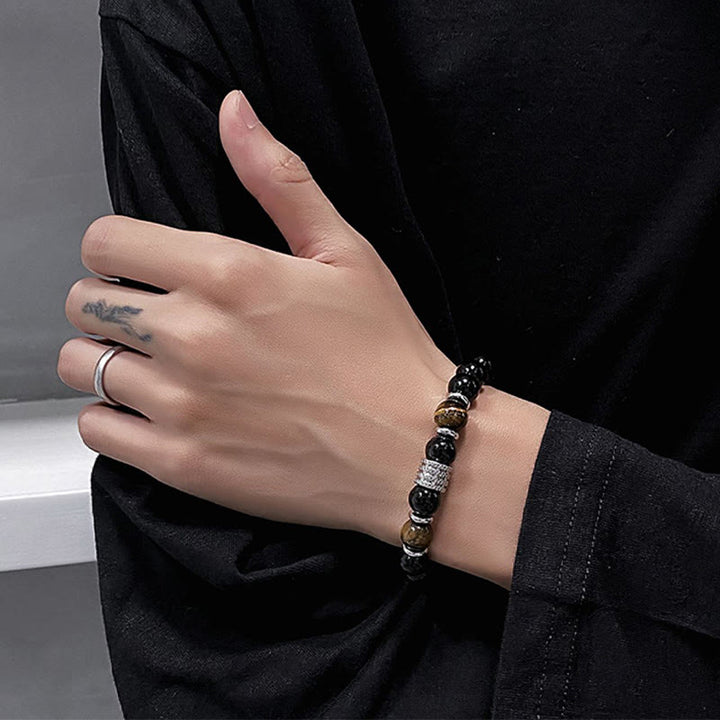 Bracciale Buddha Stones in ossidiana nera naturale con occhio di tigre e forza