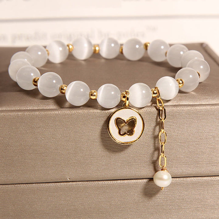 Braccialetto dell'amore con ciondolo a farfalla con occhio di gatto Buddha Stones