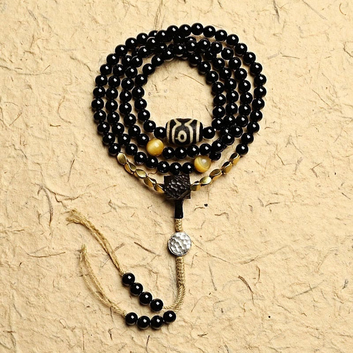 Buddha Stones Tibetano 108 Mala Beads Onice Nero Tre Occhi Dzi Beads Bracciale di Protezione