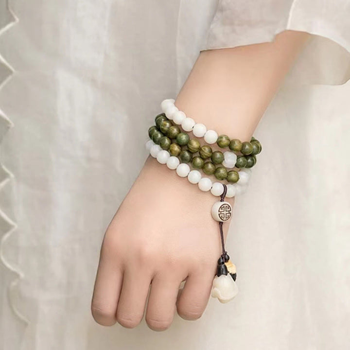 Braccialetto rilassante con semi di Bodhi in legno di sandalo verde naturale Buddha Stones