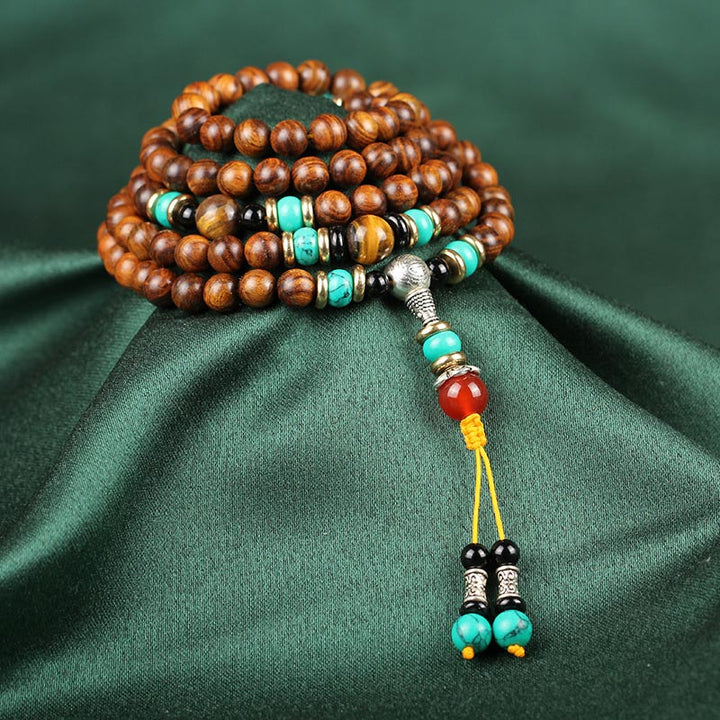 Braccialetto di guarigione Mala con 108 perle di occhio di tigre e legno di palissandro Buddha Stones