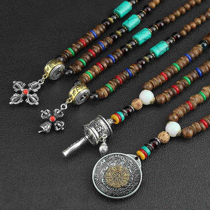 Buddha Stones Tibetano Om Mani Padme Hum Ruota della Preghiera Rotazione Vajra Collana Pendente in Legno - image 21