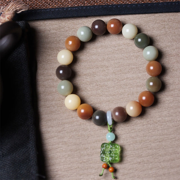 Braccialetto della pace con ciondolo in vetro Liuli con semi di Bodhi multicolore sfumato naturale Buddha Stones