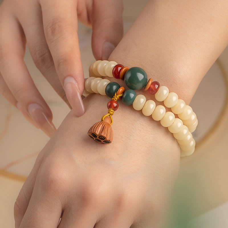 Braccialetto doppio giro Buddha Stones Bodhi Seed Lotus Baccello Charm Peace