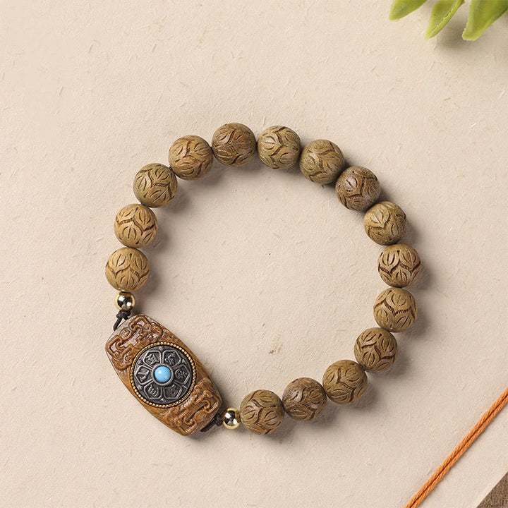 Braccialetto rilassante Om Mani Padme Hum in legno di sandalo verde e legno di ebano e sandalo Buddha Stones