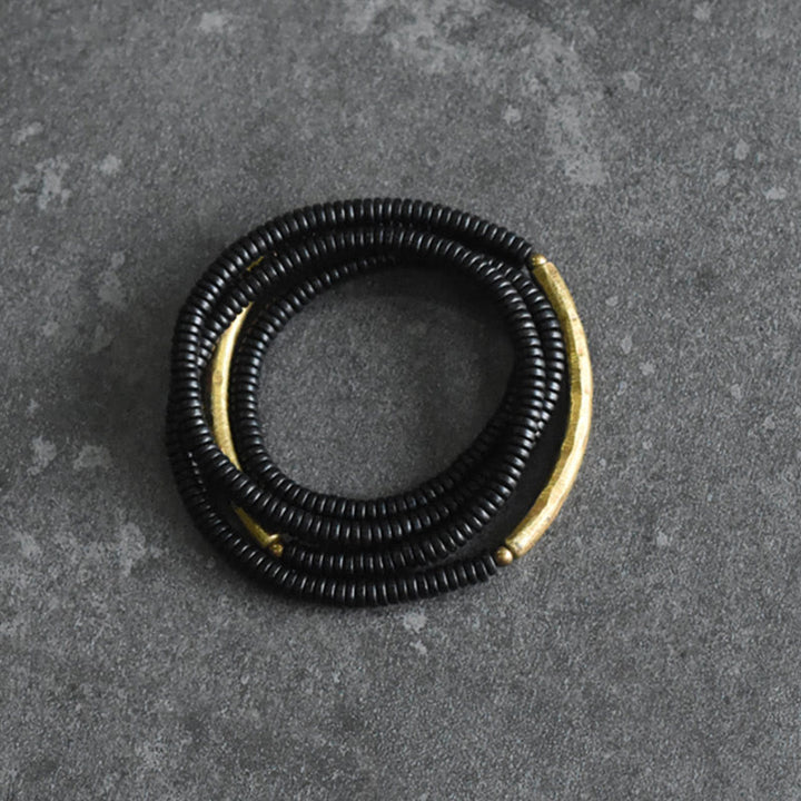 Bracciale multistrato in legno di ebano e rame Buddha Stones Balance