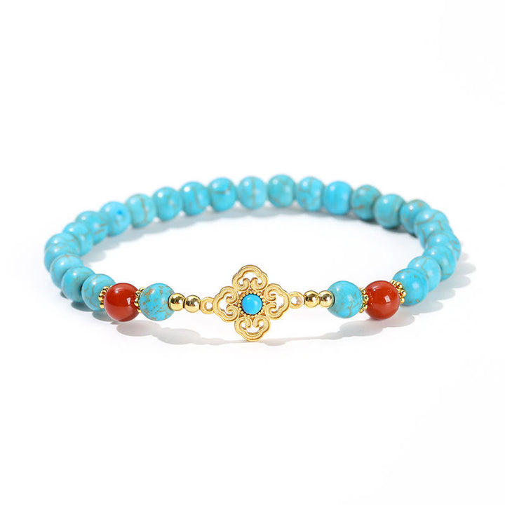 Braccialetto di protezione dell'equilibrio con perline turchesi Buddha Stones