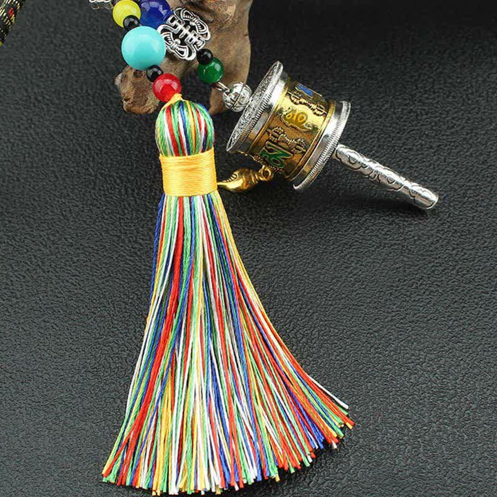 Tibet Om Mani Padme Hum Ruota di preghiera Borsa con nappa Decorazione da appendere all'auto
