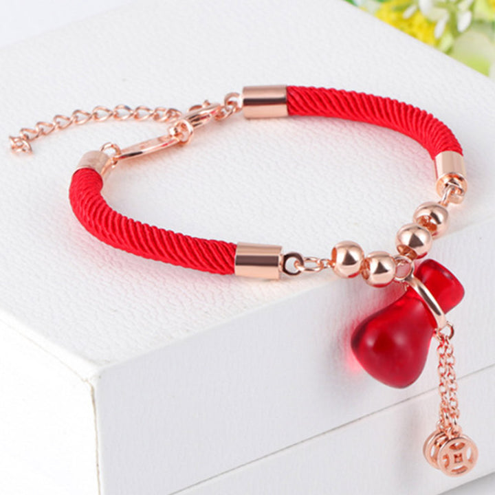 Braccialetto Buddha Stones Wealth Attractor con corda rossa e agata rossa