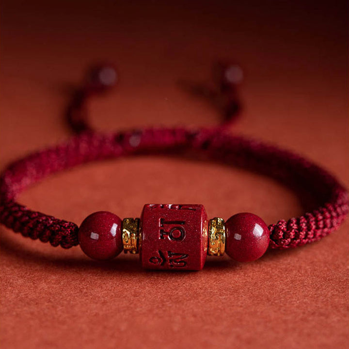 Buddha Stones Tibet Cinabro Om Mani Padme Hum Braccialetto intrecciato con benedizione inciso