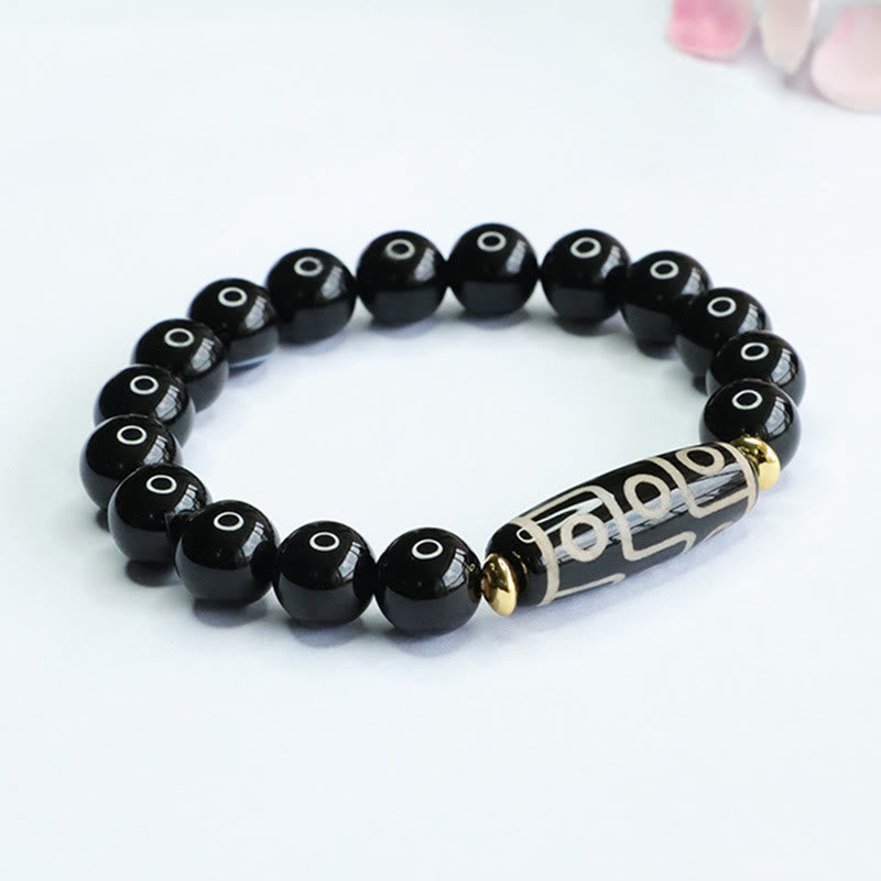 Braccialetto di potere in onice nero con perline Dzi tibetane a nove occhi Buddha Stones