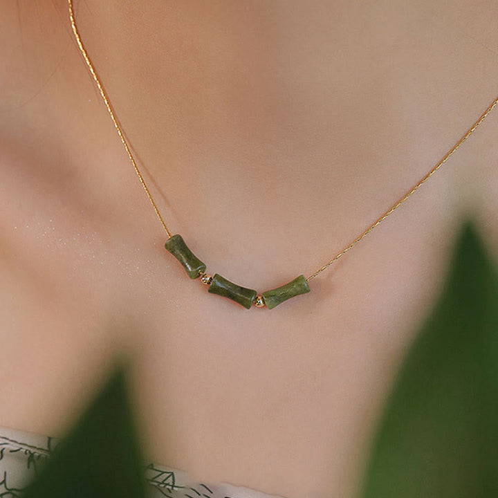Collana con ciondolo di ricchezza in giada con foglie di bambù e Buddha Stones