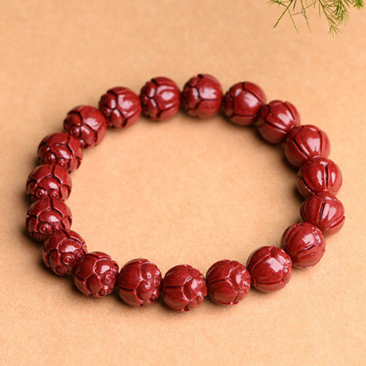 Braccialetto di benedizione del loto con motivo a fregi in cinabro naturale Om Mani Padme Hum Buddha Stones