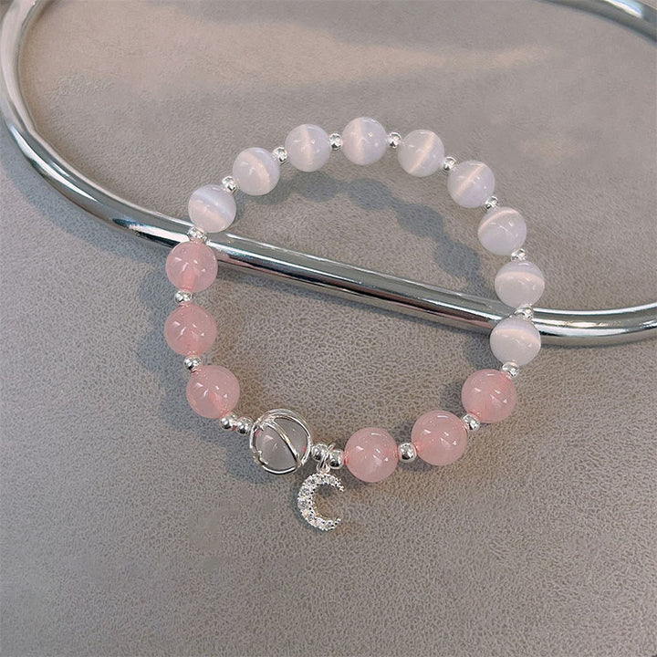 Braccialetto con ciondolo a forma di luna e cristallo rosa occhio di gatto naturale Buddha Stones