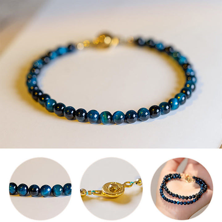 Braccialetto di protezione con catena in pietra naturale occhio di tigre blu Buddha Stones