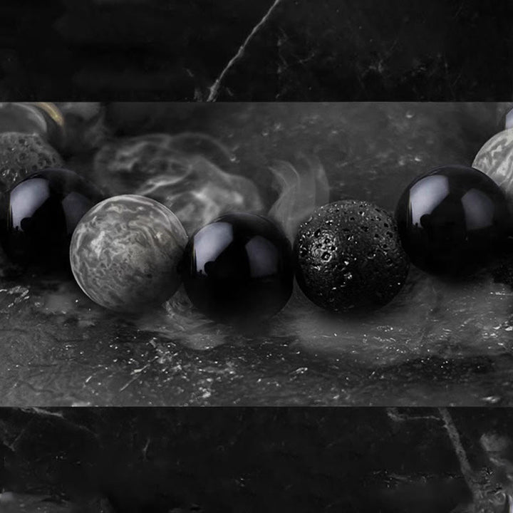 Braccialetto di forza Yin Yang in pietra lavica di ossidiana nera Buddha Stones
