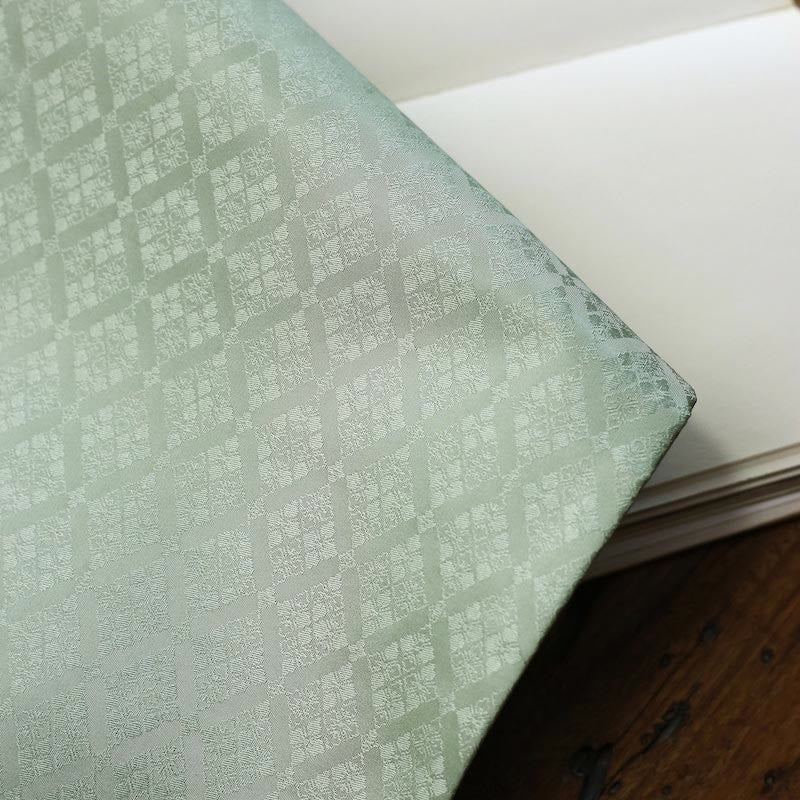 Elegante sottobicchiere per tazza da tè con motivo broccato floreale