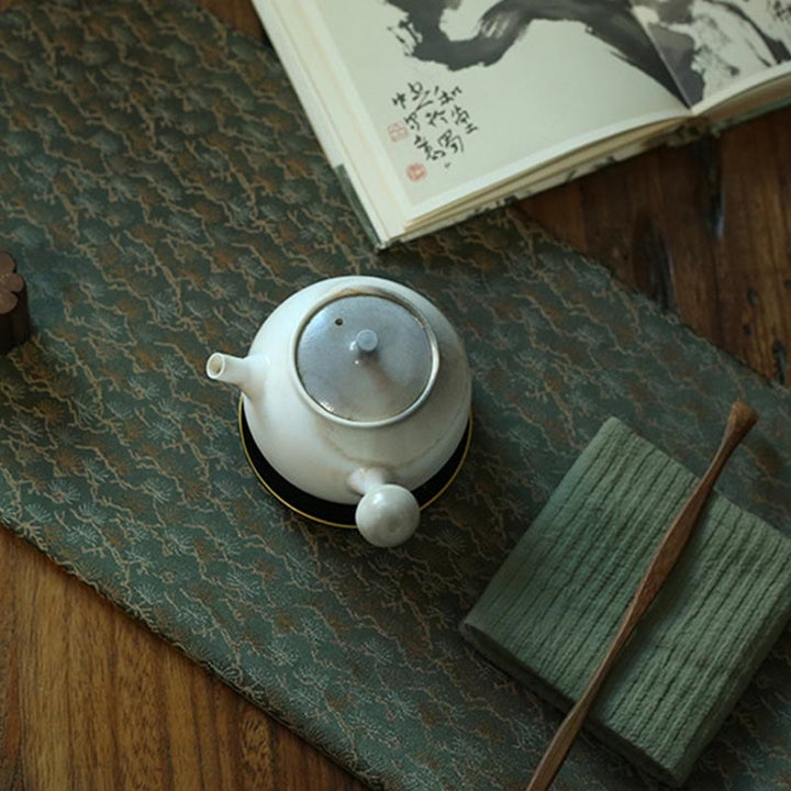 Elegante sottobicchiere per tazza da tè con motivo broccato floreale