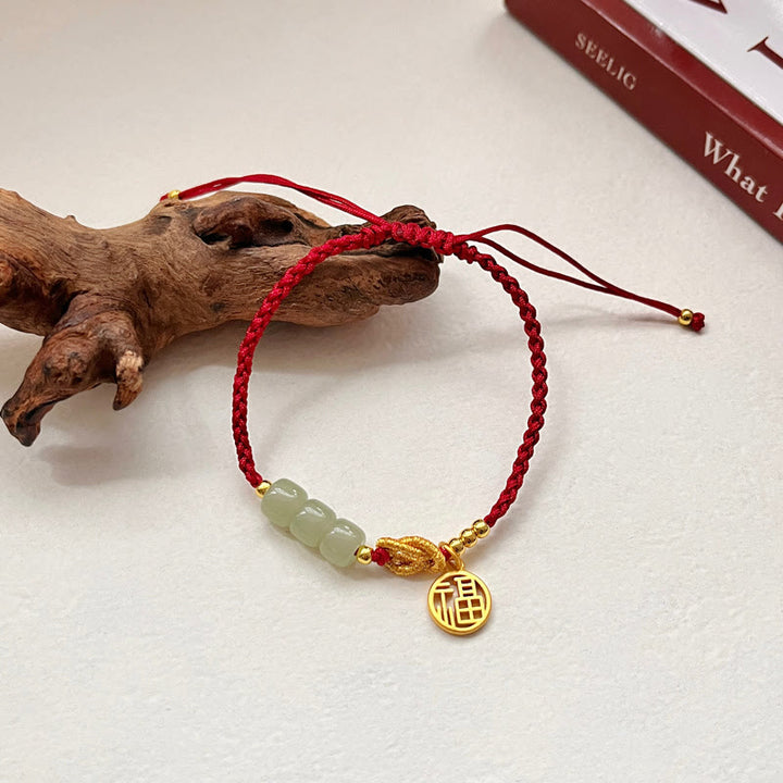 Braccialetto con corda rossa con ciondolo a forma di carattere Fu, con perline di giada lavorate a mano Buddha Stones