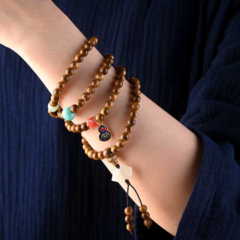 Braccialetto di protezione e calma in palissandro tibetano Buddha Stones Mala