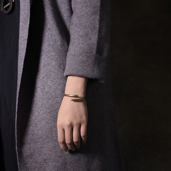 Bracciale regolabile con polsino in rame e design rustico Buddha Stones