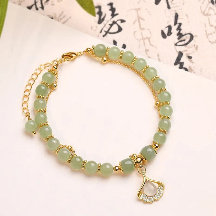 Braccialetto di perline con carattere Fu , Buddha Stones di giada, foglia di ginkgo, tulipano, arachidi e fortuna