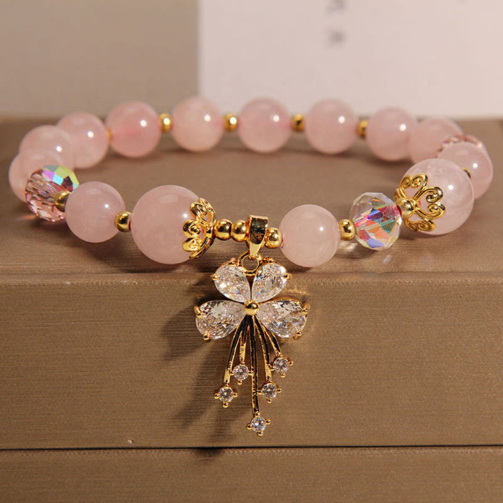 Braccialetto con ciondolo a farfalla in zircone con cristalli rosa e acquamarina Buddha Stones