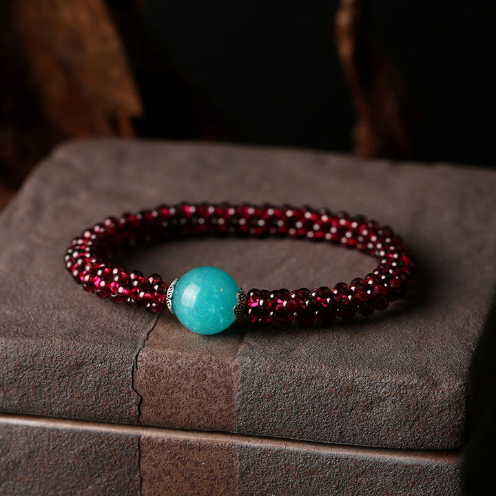 Braccialetto di protezione con perline di agata rossa, cristallo rosa e granato naturale Buddha Stones