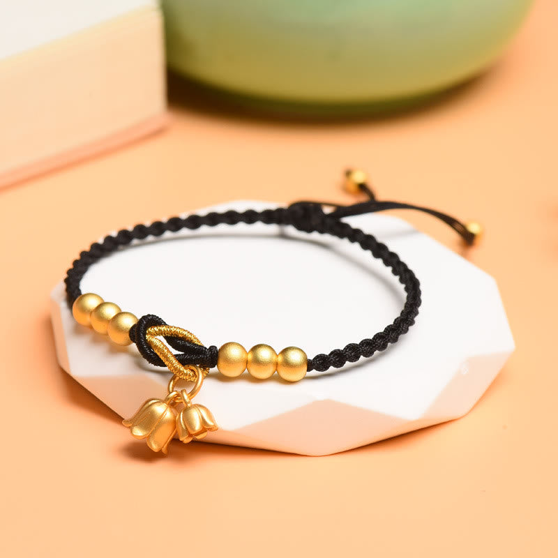 Bracciale intrecciato con ciondolo a forma di fiore di mughetto fatto a mano con Buddha Stones e protezione dalla fortuna