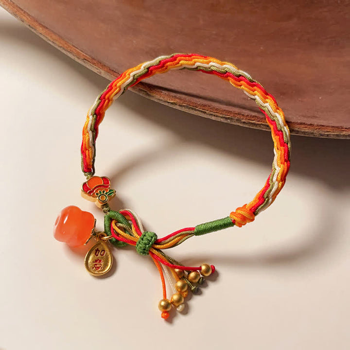 Braccialetto con corda intrecciata con nodo di reincarnazione in agata rossa e cachi Buddha Stones
