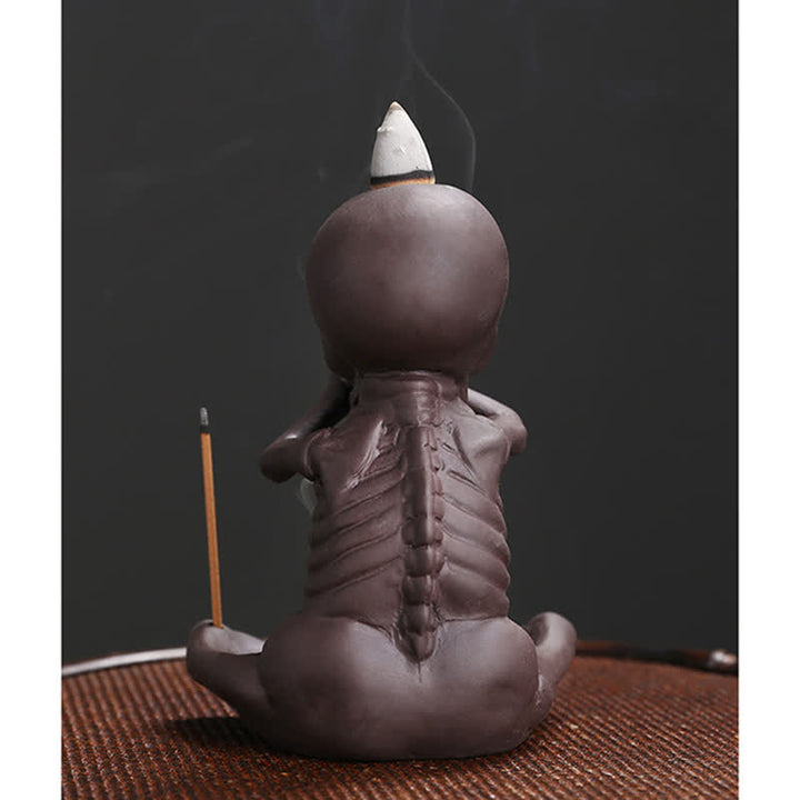 Buddha Stones Piccolo teschio Fantasma Argilla viola Fontana di fumo a riflusso Bruciatore di incenso della pace Decorazione