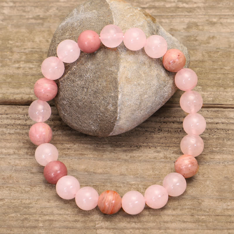 Braccialetto con nappa di cristallo rosa e 108 perle di Mala Buddha Stones