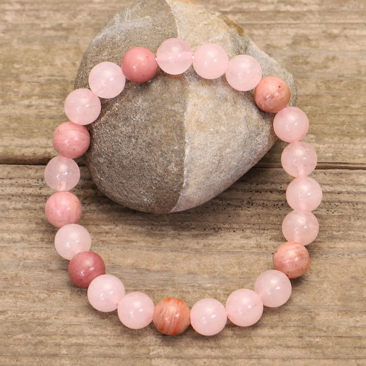 Braccialetto con nappa di cristallo rosa e 108 perle di Mala Buddha Stones