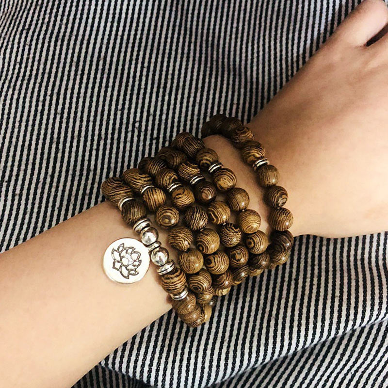 Braccialetto in legno tibetano Buddha Stones a forma di loto Mala - image 2
