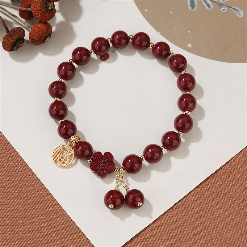 Braccialetto di benedizione con fiori di ciliegio e carattere Fu in pietra di cinabro Buddha Stones