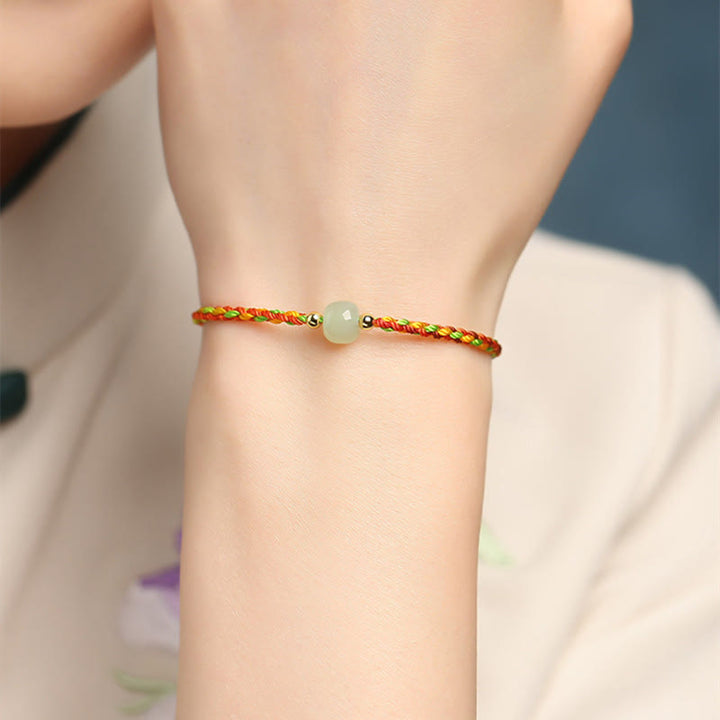 Braccialetto di abbondanza di perline di giada con corda colorata Buddha Stones Luck