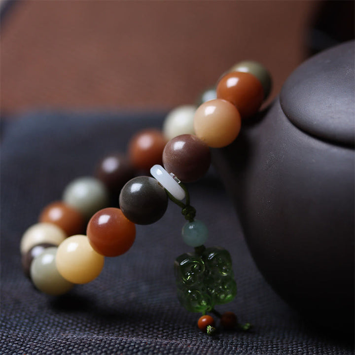 Braccialetto della pace con ciondolo in vetro Liuli con semi di Bodhi multicolore sfumato naturale Buddha Stones