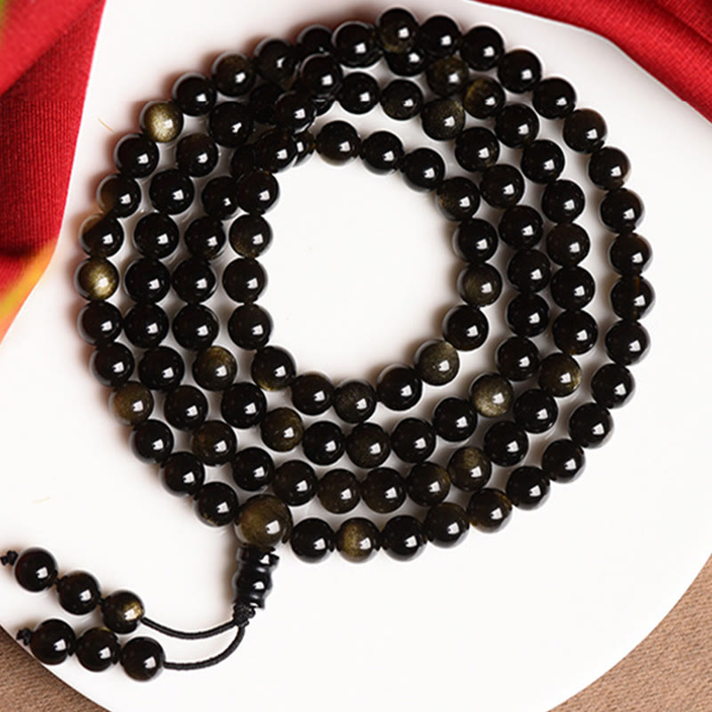 Braccialetto della ricchezza in ossidiana naturale con 108 perle di Mala Buddha Stones