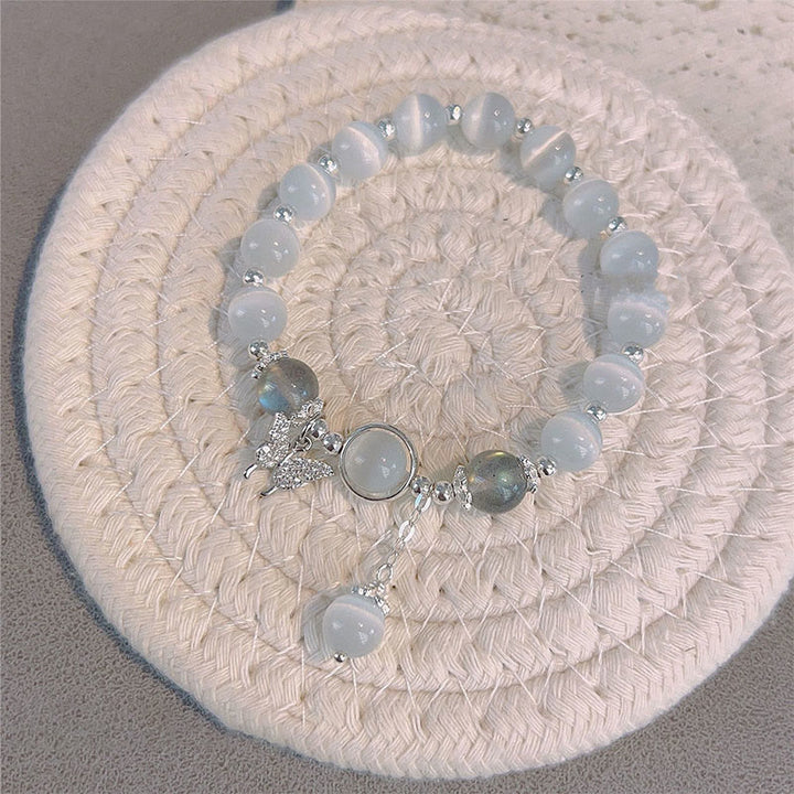 Braccialetto di supporto con ciondolo a forma di stella a forma di farfalla, pietra di luna e occhio di gatto Buddha Stones