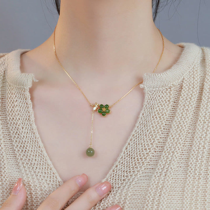 Collana con ciondolo portafortuna in argento sterling 925 con fiore di prugna in giada ciano Hetian, motivo Buddha Stones