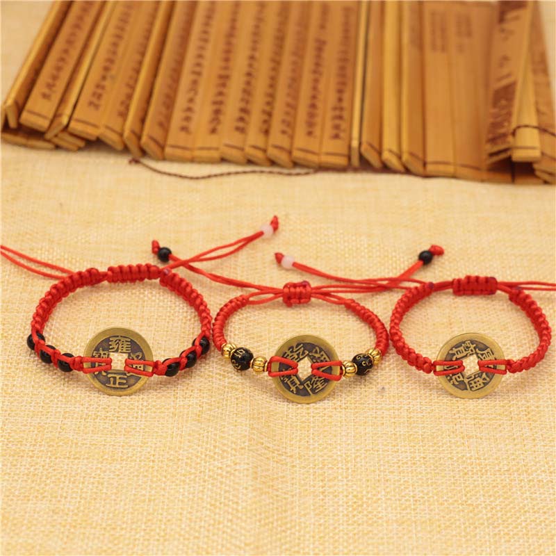 Braccialetto intrecciato con corda rossa, moneta di rame e Buddha Stones