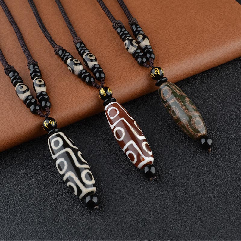 Collana di protezione della ricchezza con perline Dzi a nove occhi Buddha Stones - image 0