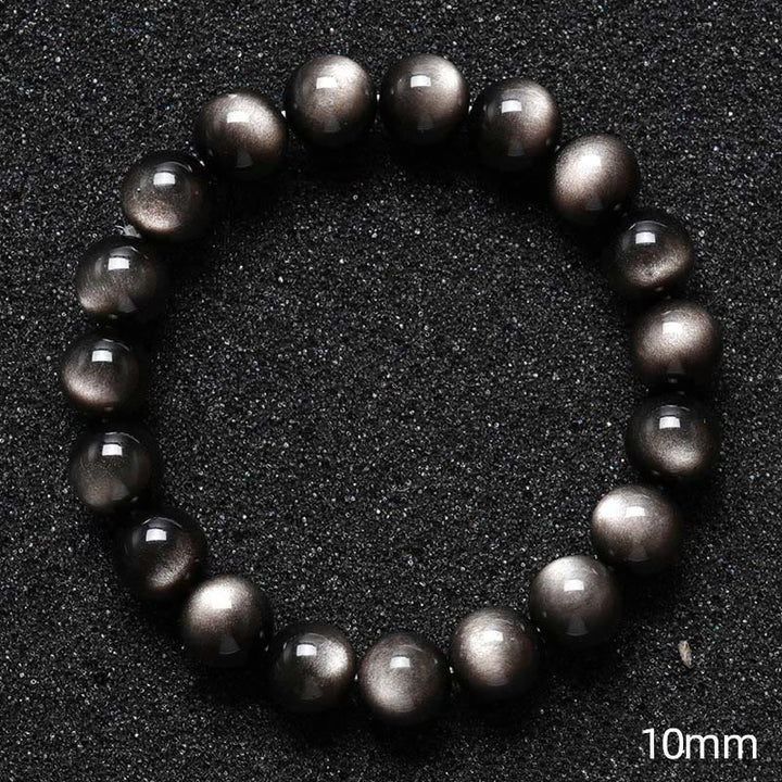 Braccialetto di protezione lenitiva in ossidiana lucida d'argento naturale Buddha Stones